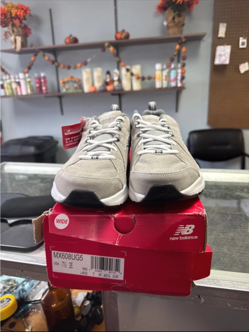 New Balance Men's Light Gray Athletic Walking Sneakers with Red Accent